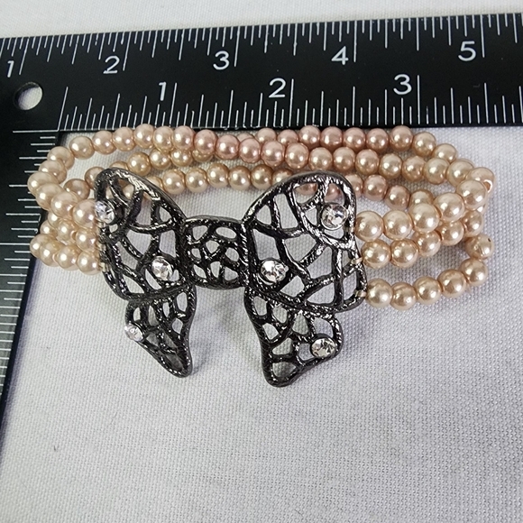 Triple Strand Pearl Bracelet with Gunmetal Bow - Picture 9 of 9